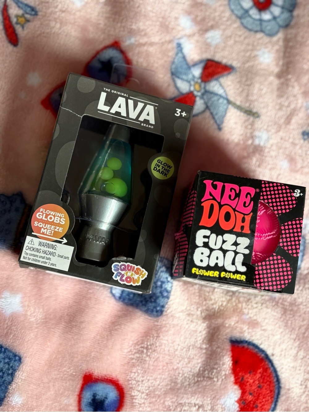 LAVA Glow-in-the-Dark Mini Lava Lamp and pink fuzz ball